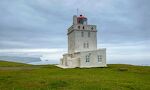 Dyrhólaey Fyrtårn er 13 m højt og blev bygget i 1927. Det markerer det sydligste punkt på Islands hovedø. Dyrhólaey Fyrtårn er 13 m højt og blev bygget i 1927. Det markerer det sydligste punkt på Islands hovedø.