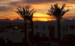 Endnu en solnedgang over Hotel Saraya set fra Sunset Bar på en sjælden aften med skyer på himlen. Endnu en solnedgang over Hotel Saraya set fra Sunset Bar på en sjælden aften med skyer på himlen.